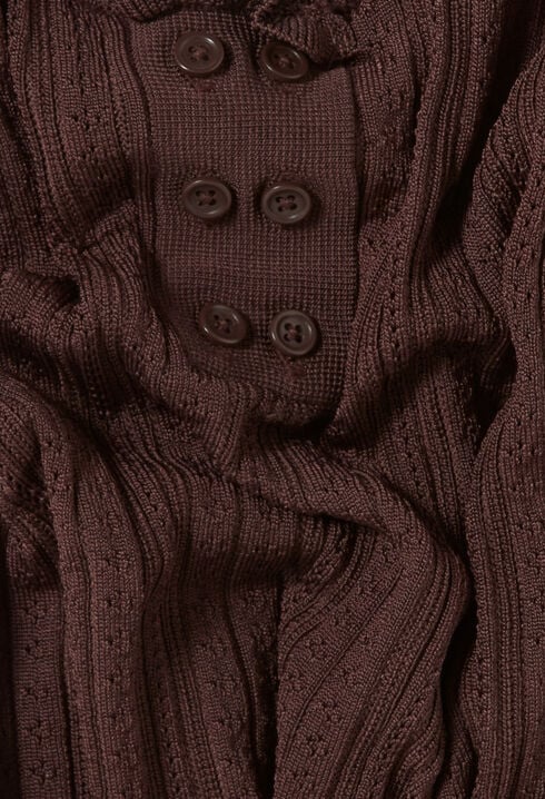 Top de punto calado con volante