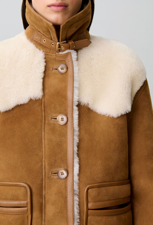 Chaqueta doble faz cuello cuero