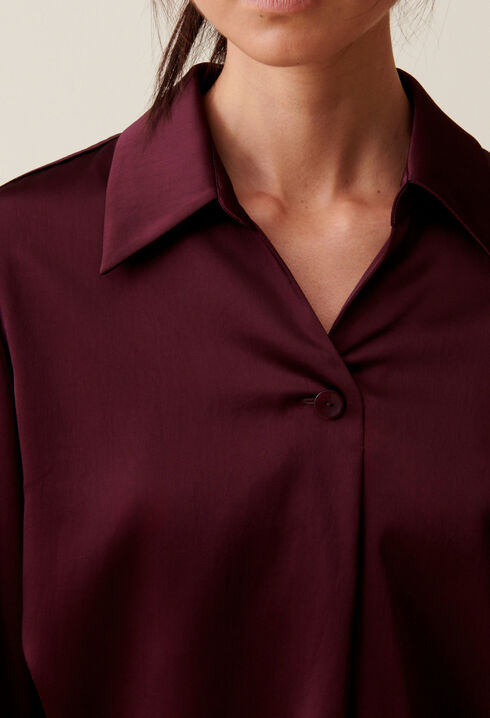 Blusa fluida cuello abierto