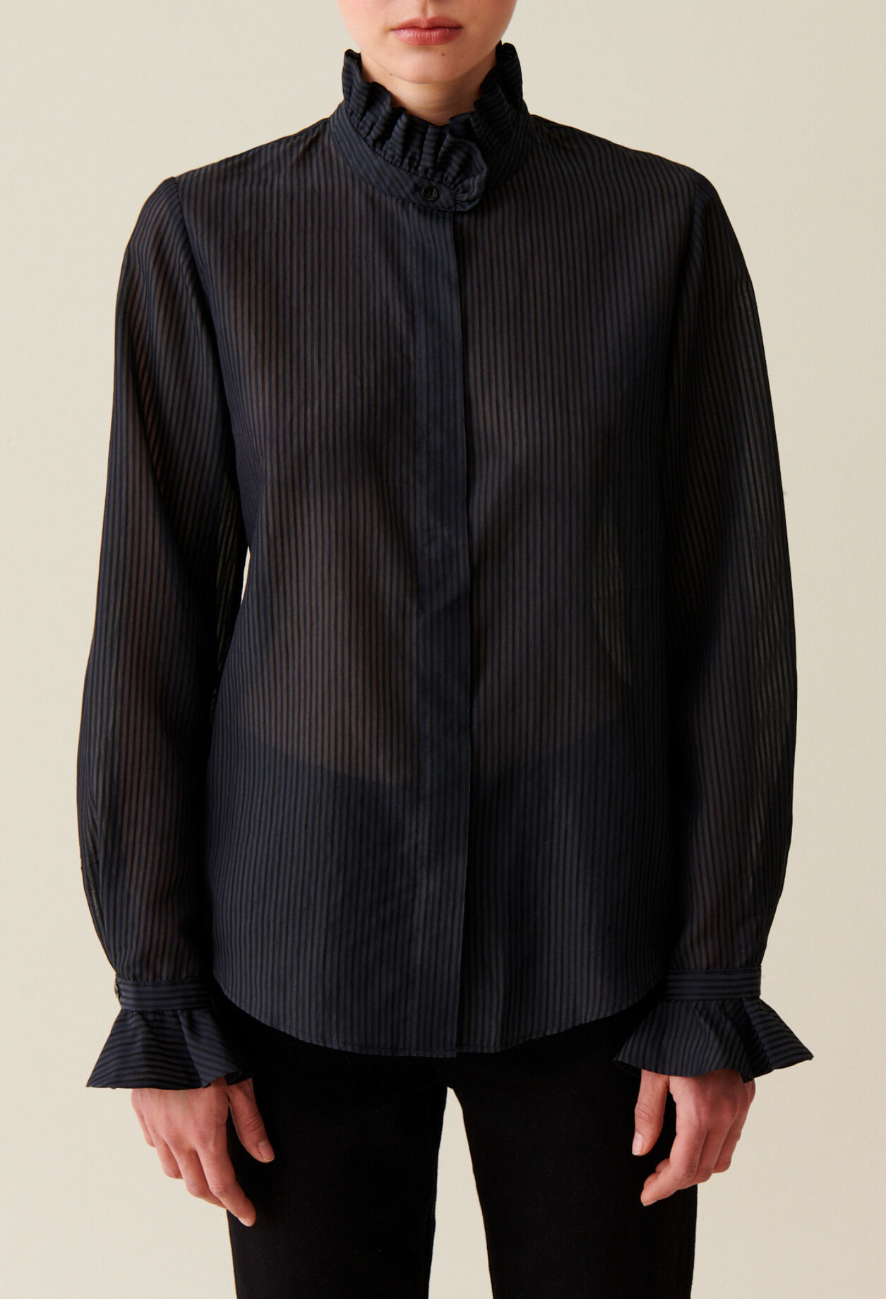 Blusa fluida cuello volante a rayas