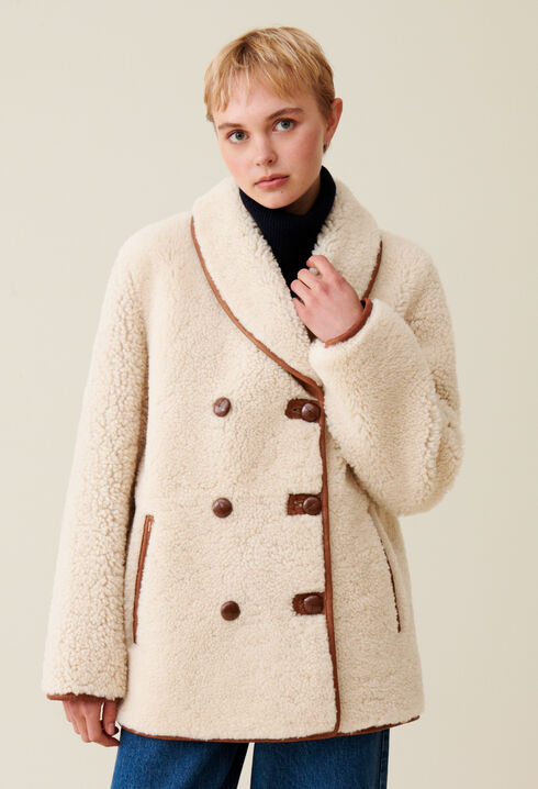 Abrigo reversible de piel lanosa