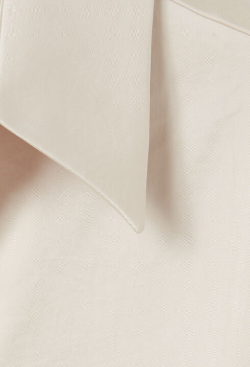 Blusa fluida plisada