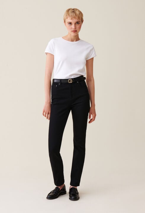 Vaqueros slim negros de tiro medio