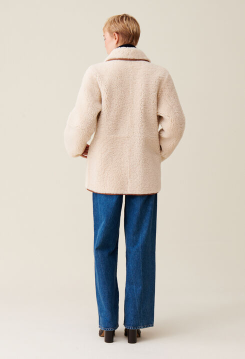 Abrigo reversible de piel lanosa