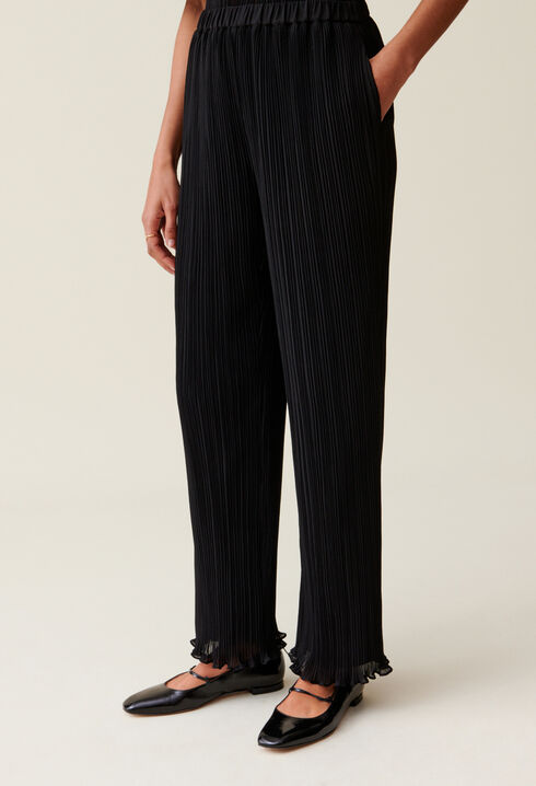 Pantalón fluido con volantes