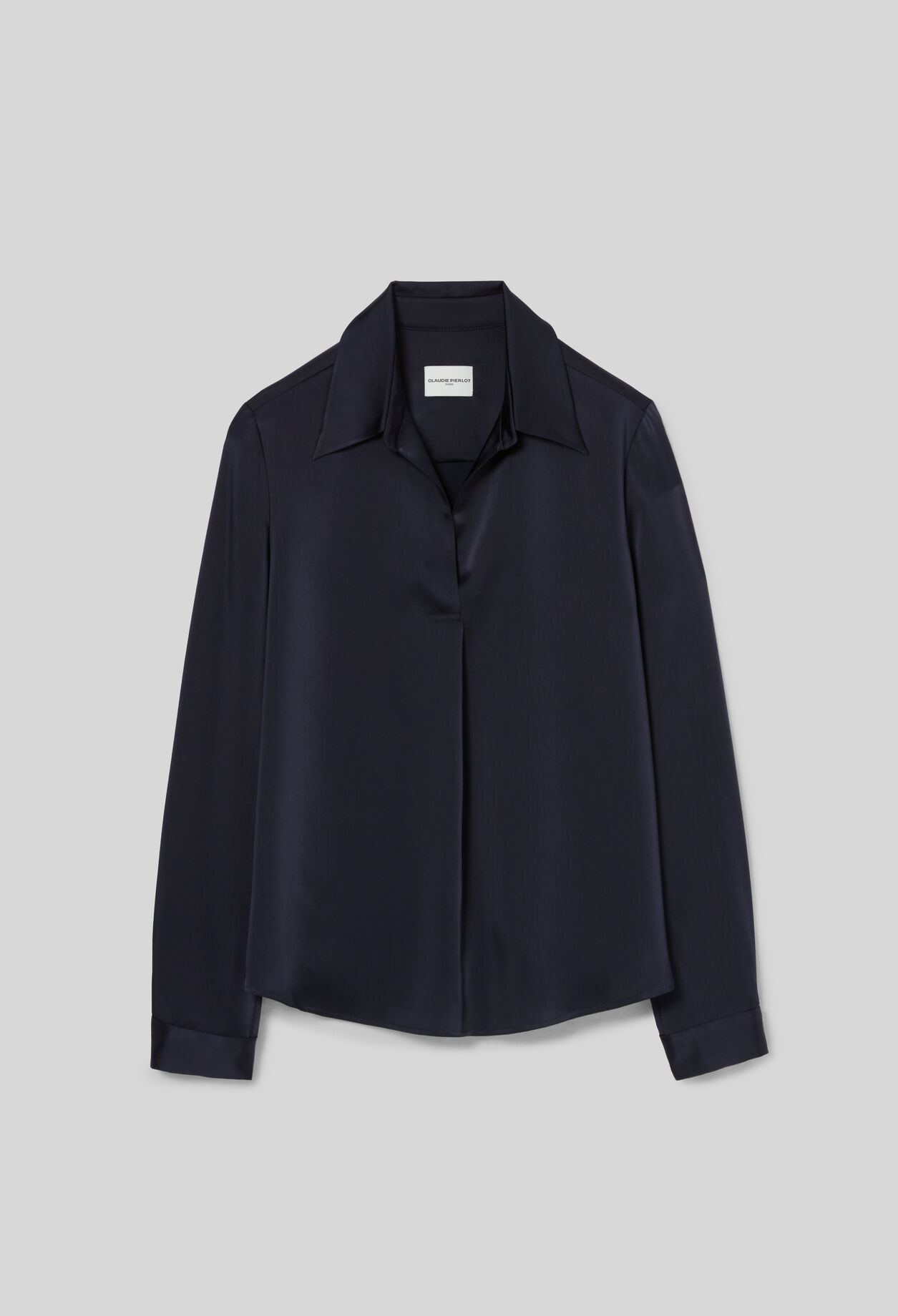 Blusa recta con pliegues
