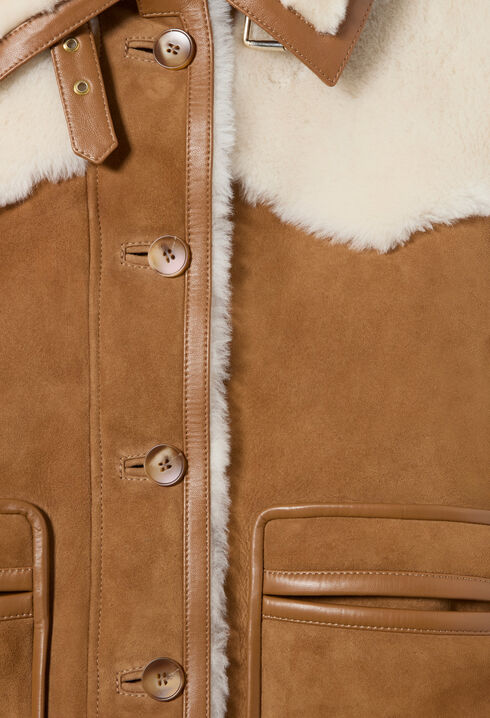 Chaqueta doble faz cuello cuero