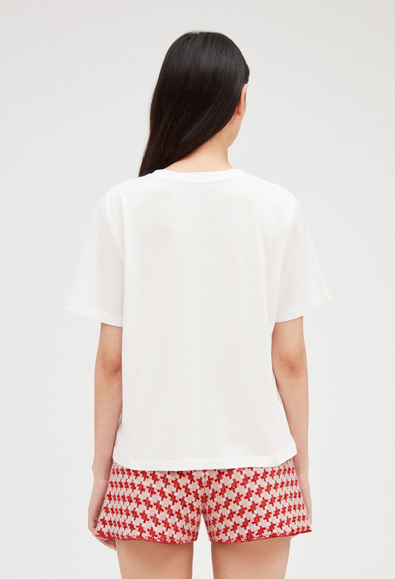 Camiseta crudo con bolsillos de tweed