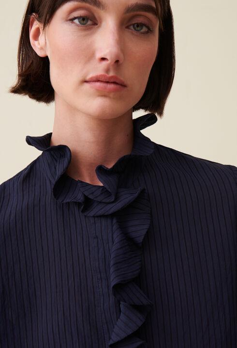 Blusa de rayas volantes azul oscuro