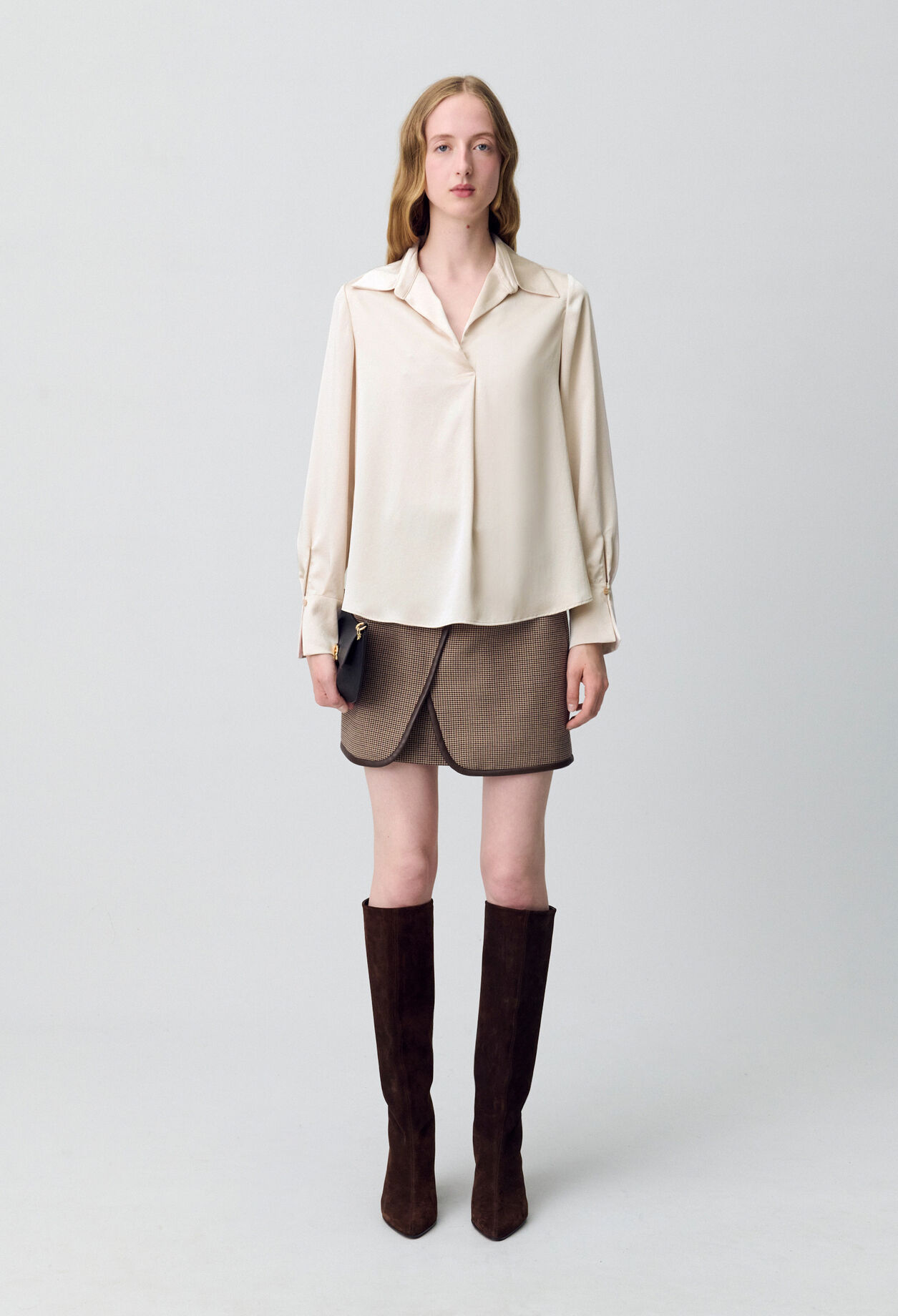 Blusa fluida plisada
