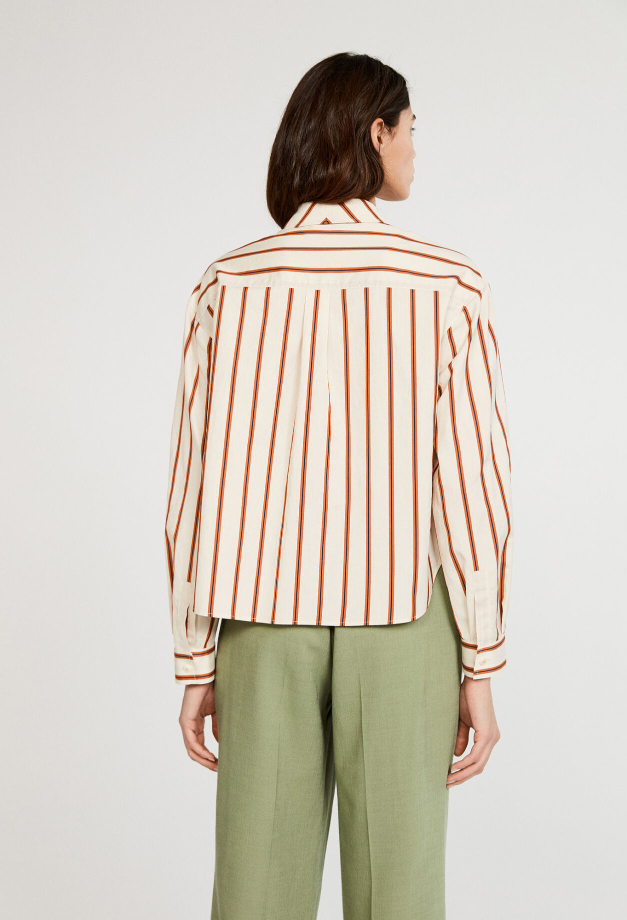 Camisa acampanada