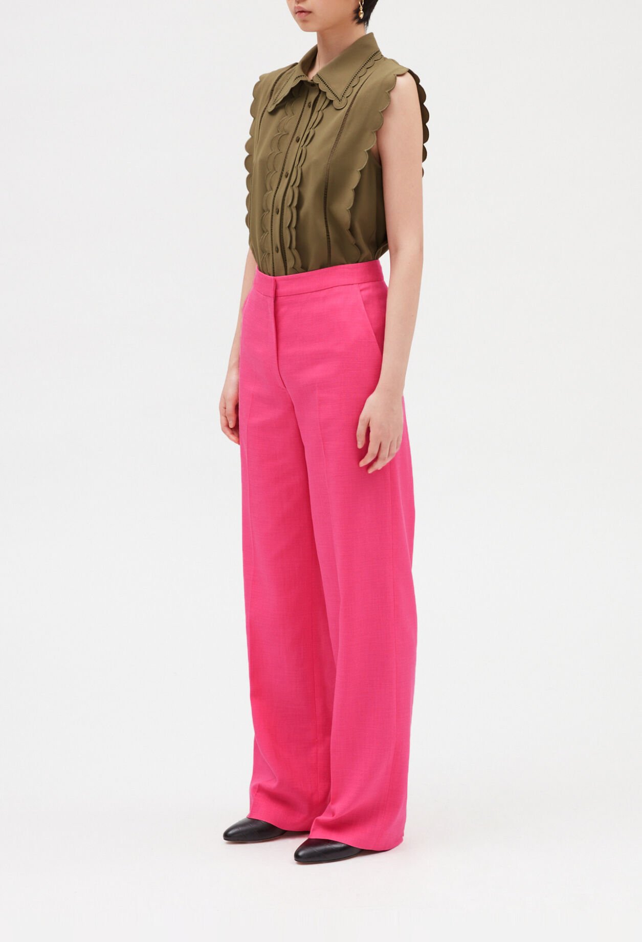 Camisa festoneada sin mangas