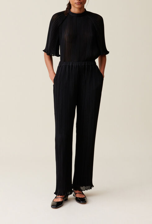 Pantal&oacute;n fluido con volantes