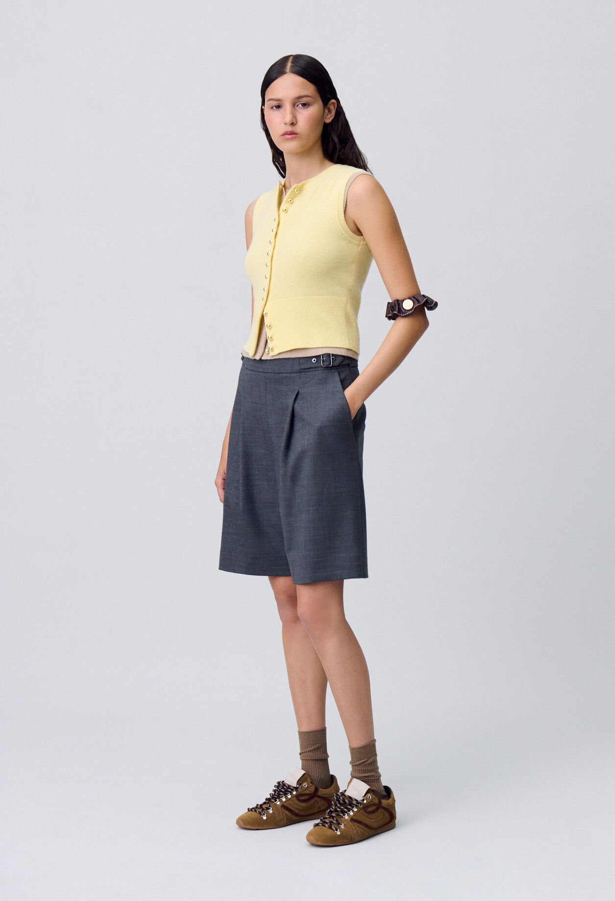 Bermudas cortos con pliegues
