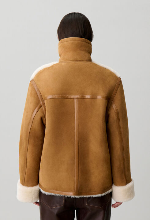 Chaqueta doble faz cuello cuero