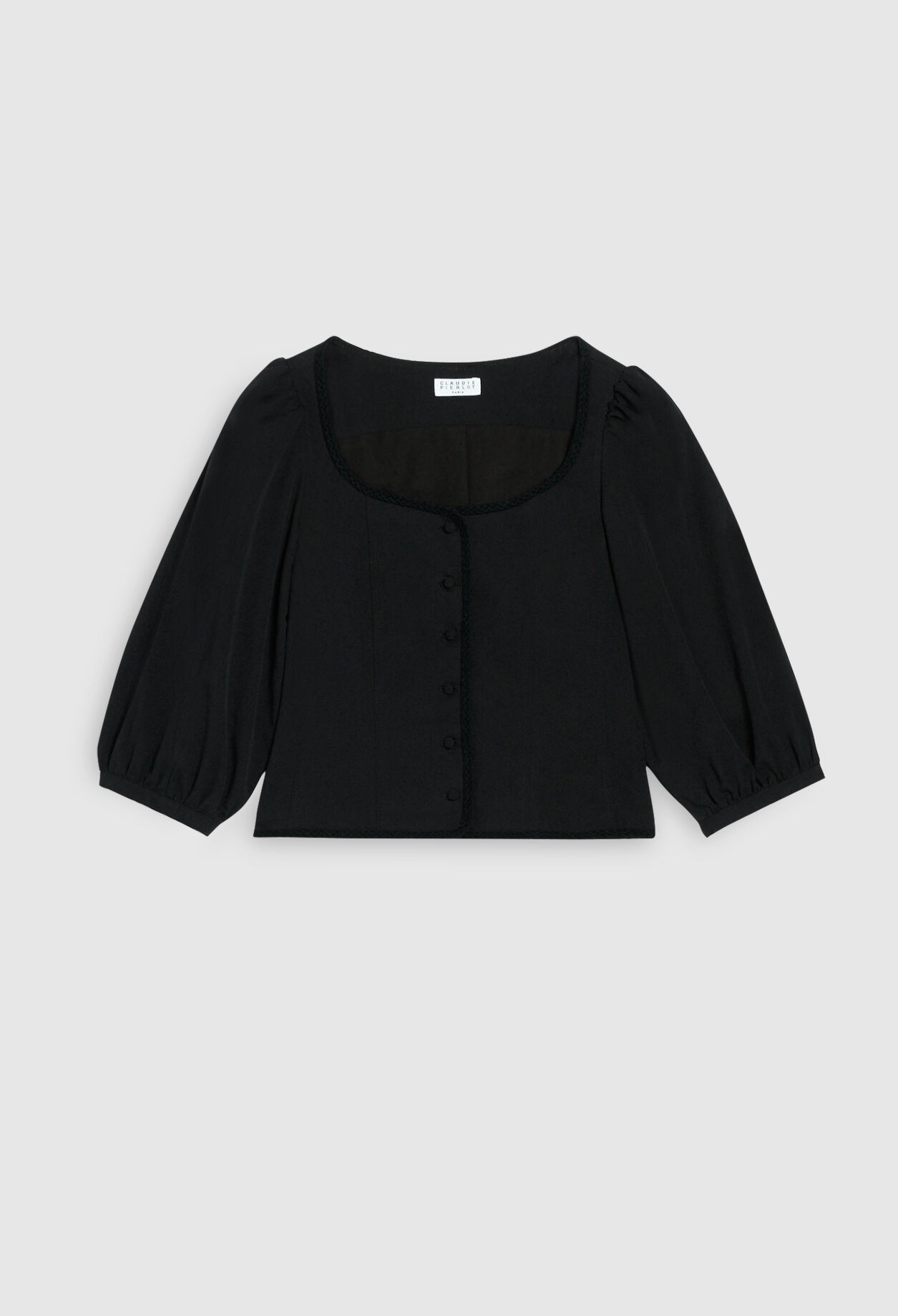 Blusa negra con mangas abullonadas
