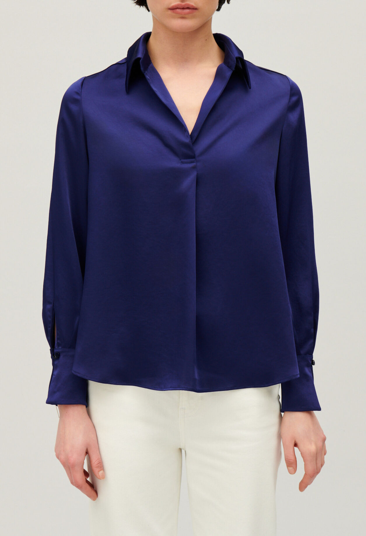 Blusa fluida plisada