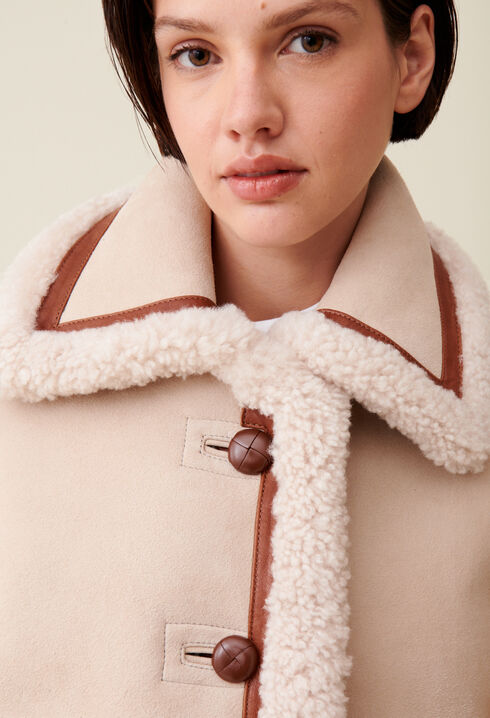 Chaqueta de piel lanosa beige