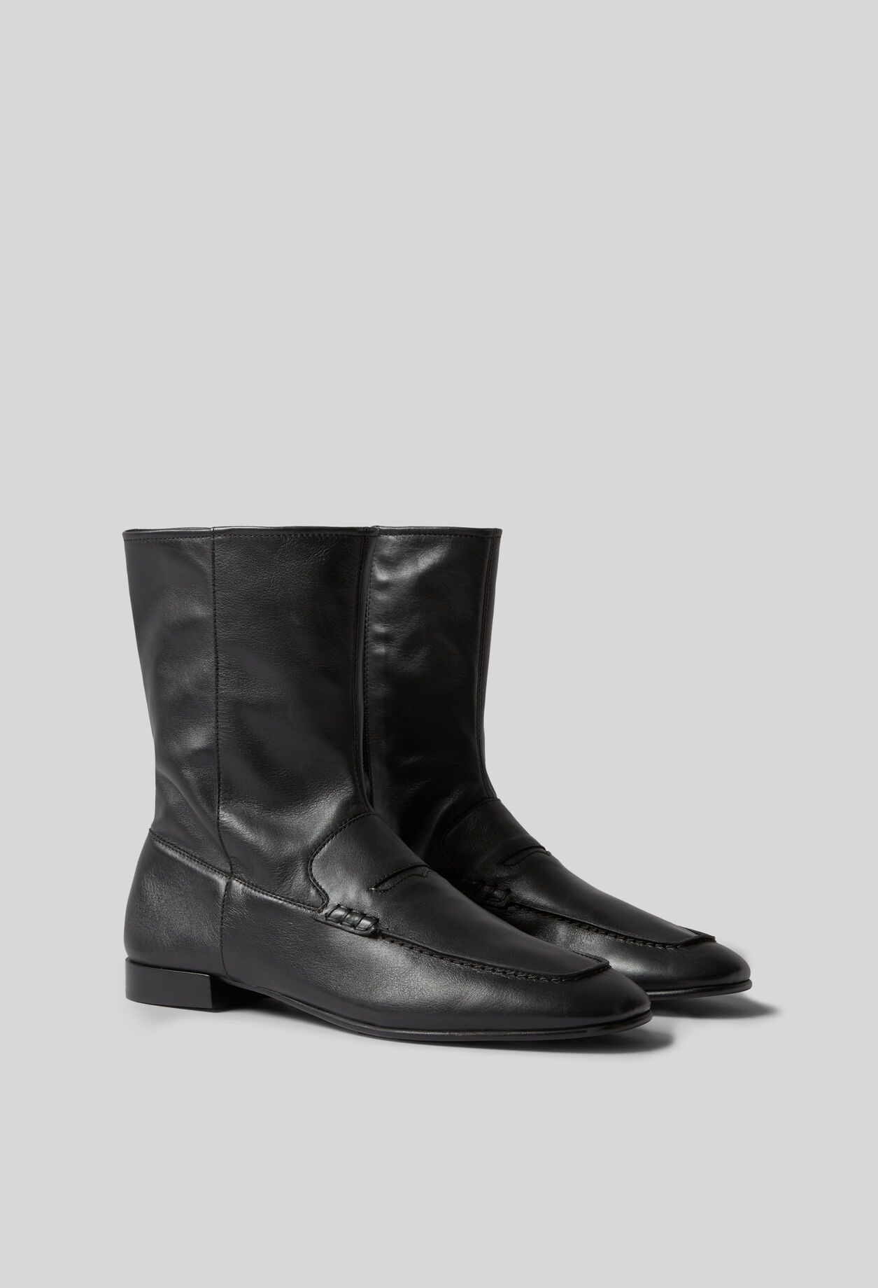 Botines de cuero estilo mocasín