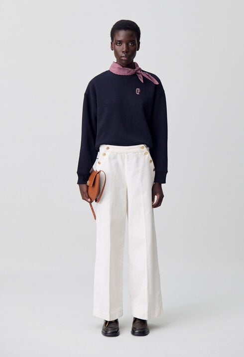 Pantalón vaquero con botones