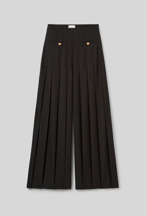 Pantalón amplio con pliegues