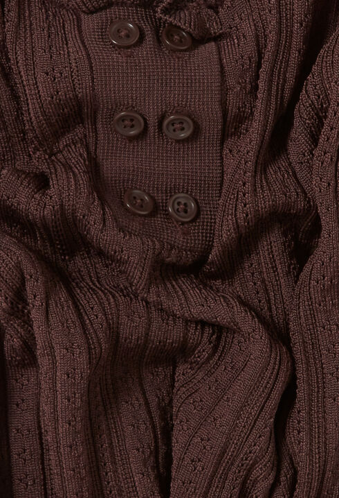 Top de punto calado con volante