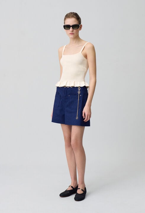 Top satinado con volantes
