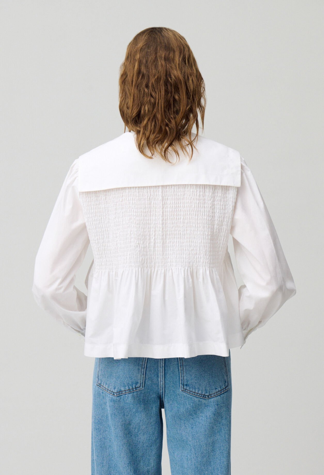 Blusa con volantes