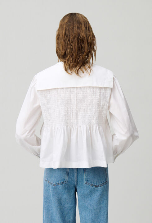 Blusa con volantes