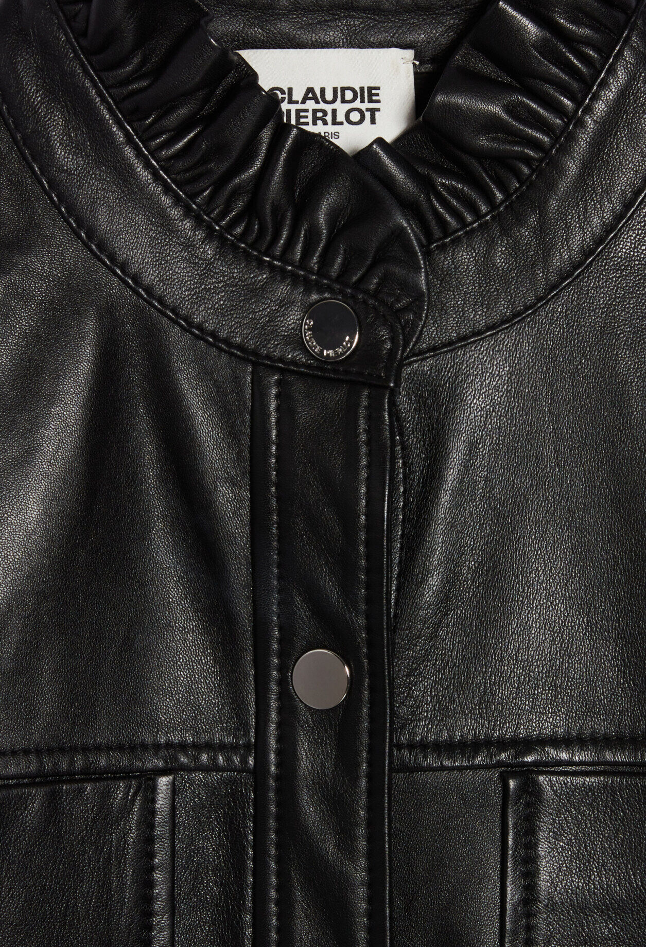 Camisa cuero con cuello volante