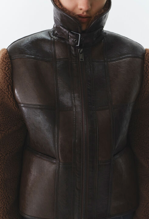 Chaqueta corta de dos tejidos