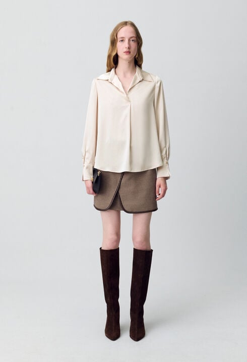 Blusa fluida plisada