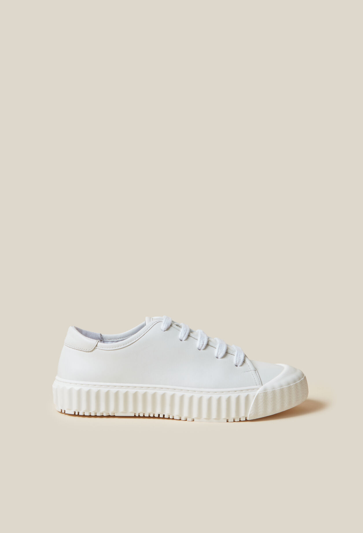 Zapatillas de cuero blancas