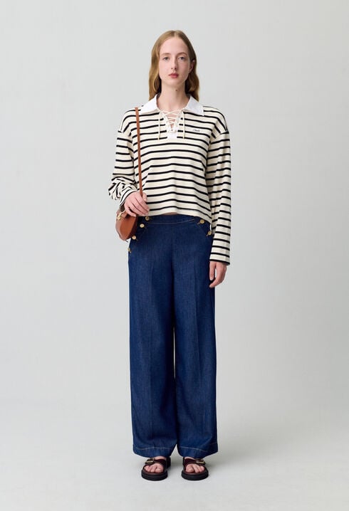 Pantalón vaquero ancho con botones