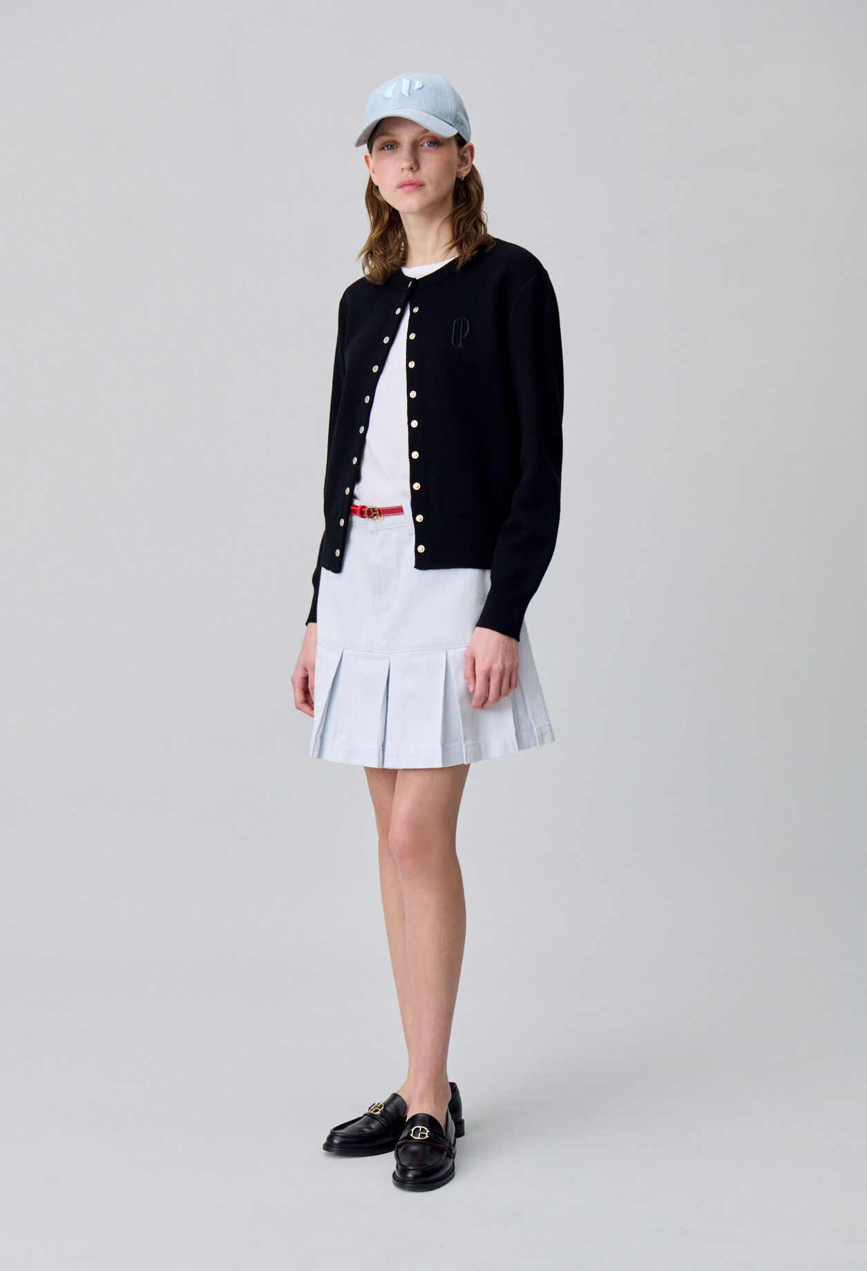 Falda corta de denim con pliegues