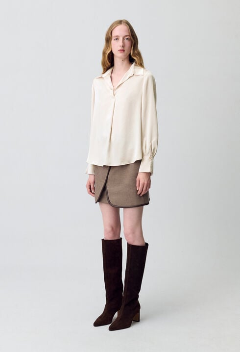 Blusa fluida plisada