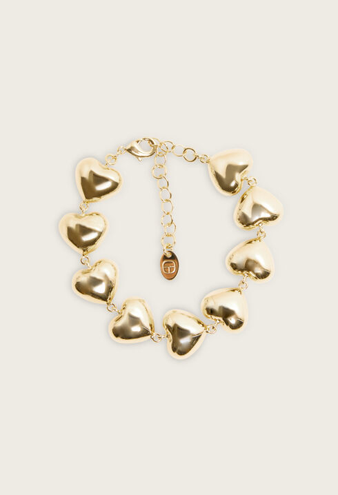 Pulsera de corazones de latón dorado