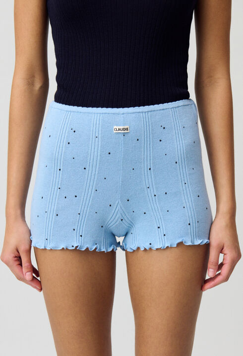 Short de punto fino.