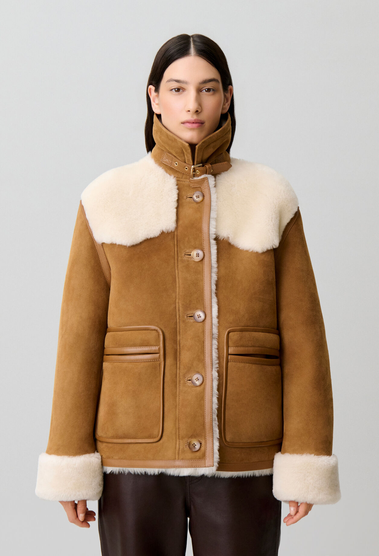 Chaqueta doble faz cuello cuero