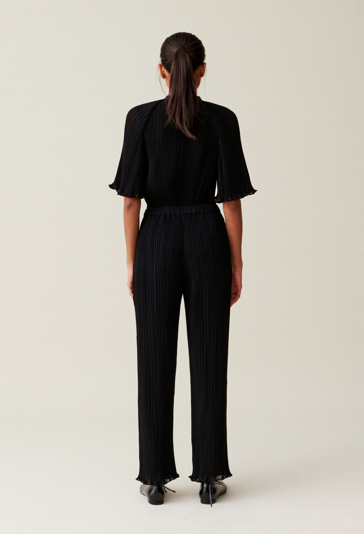 Pantal&oacute;n fluido con volantes