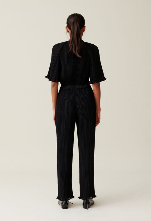 Pantal&oacute;n fluido con volantes