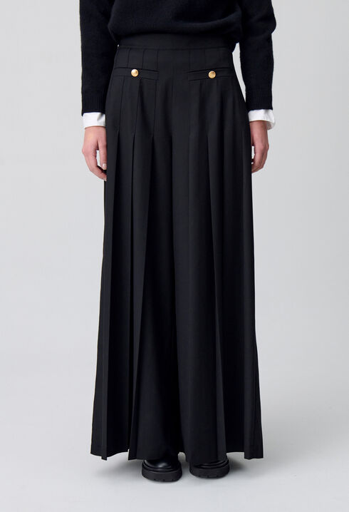 Pantalón amplio con pliegues