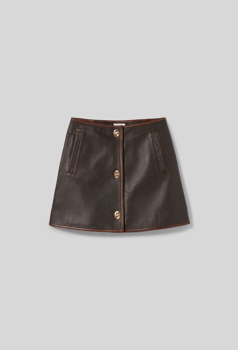 Falda de cuero trapezoidal corta