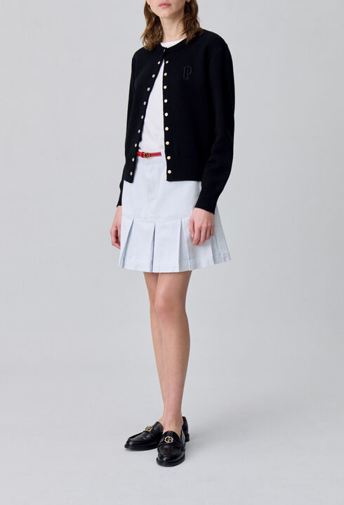 Falda corta de denim con pliegues