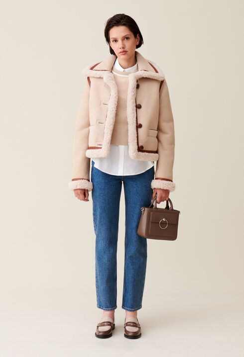 Chaqueta de piel lanosa beige