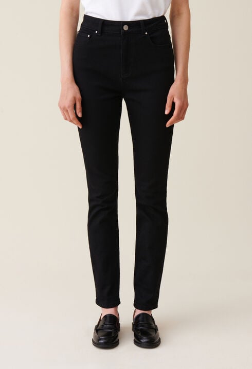 Vaqueros slim negros de tiro medio