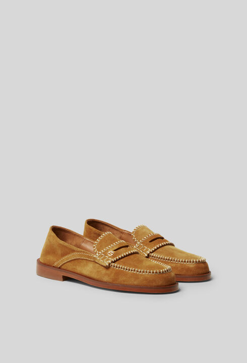 Mules ante monograma dorado
