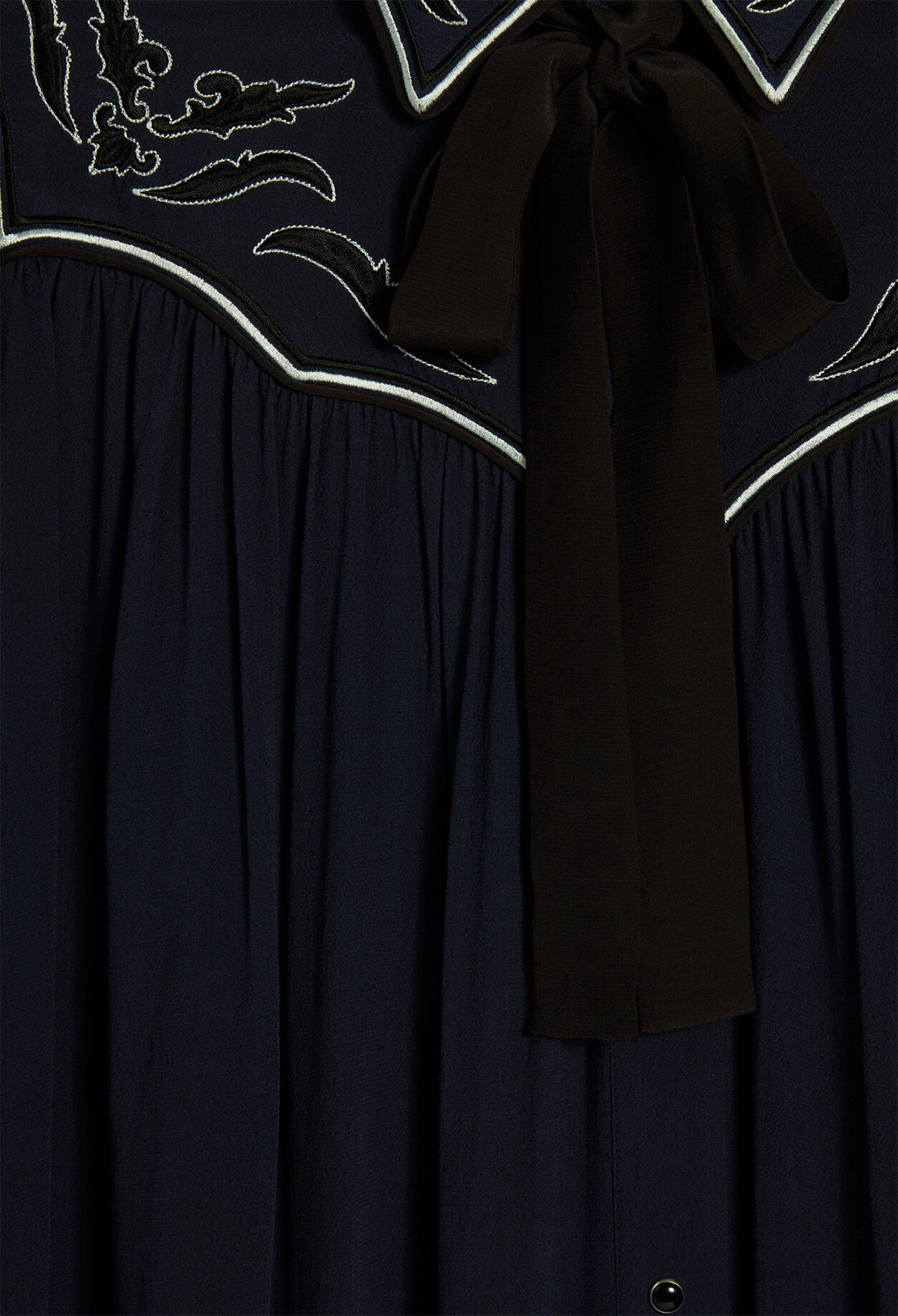 Vestido con flecos