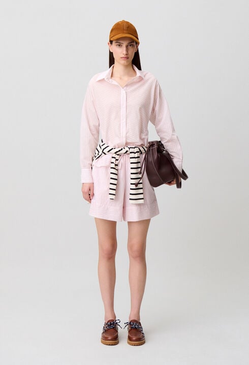 Camisa espalda con volantes