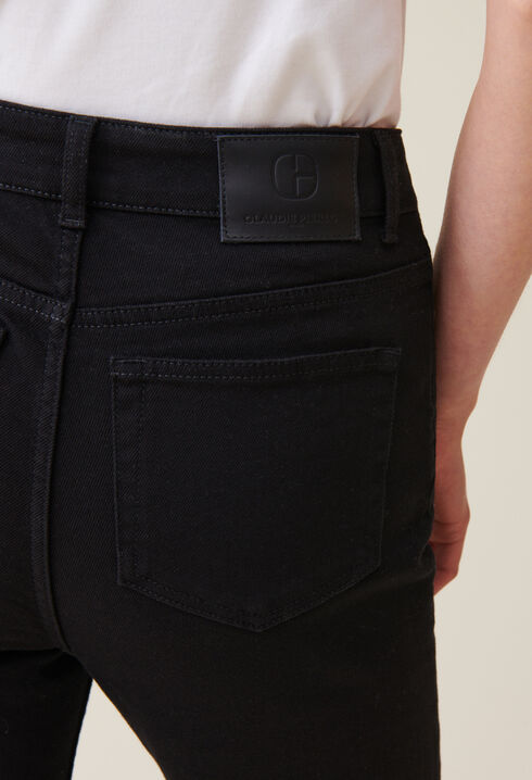 Vaqueros slim negros de tiro medio